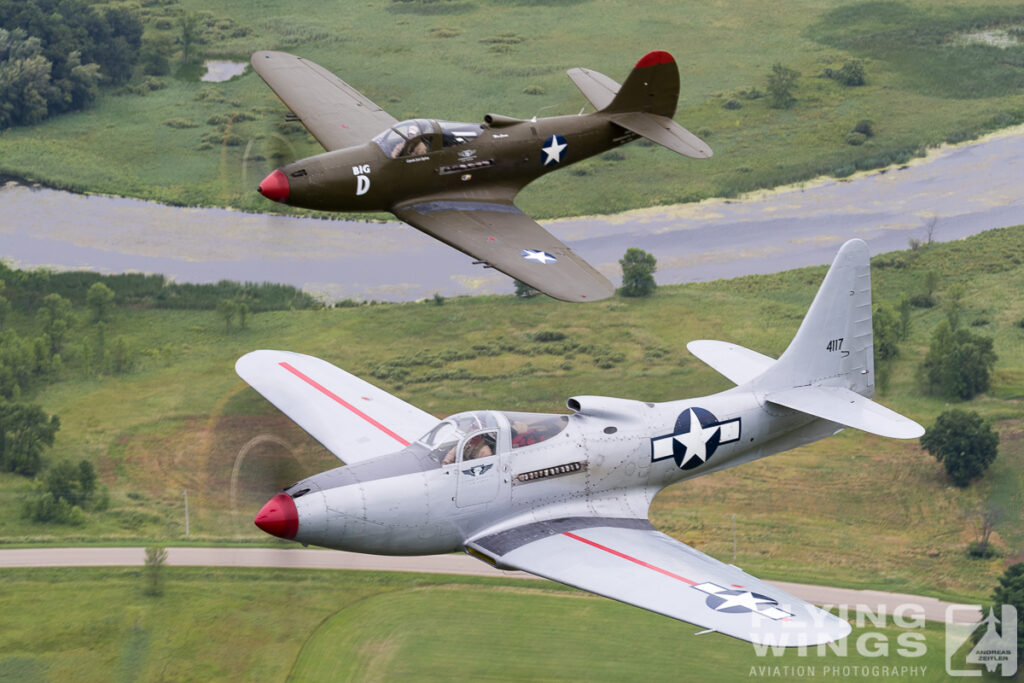 2 ship p 63 p 39 air air  4119 zeitler 1024x683 - Cobra Flight! Bell P-39 & P-63 in Formation