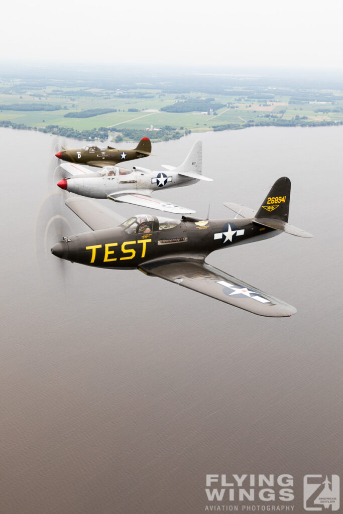 formation p 63 p 39 air air  7229 zeitler 683x1024 - Cobra Flight! Bell P-39 & P-63 in Formation