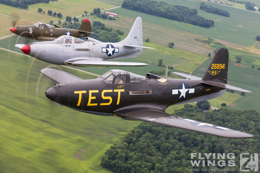 formation p 63 p 39 air air  7370 zeitler 1024x683 - Cobra Flight! Bell P-39 & P-63 in Formation