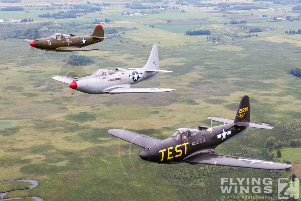 formation p 63 p 39 air air  7437 zeitler 1024x683 - Cobra Flight! Bell P-39 & P-63 in Formation